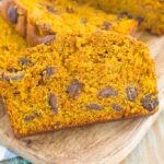 This Pumpkin Peanut Butter Spice Bread is filled with a warm pumpkin flavor, dark chocolate chips, and creamy peanut butter. Easy to make and filled with an irresistible combination, this spiced bread will become your favorite breakfast or dessert of the season!