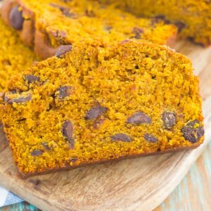 This Pumpkin Peanut Butter Spice Bread is filled with a warm pumpkin flavor, dark chocolate chips, and creamy peanut butter. Easy to make and filled with an irresistible combination, this spiced bread will become your favorite breakfast or dessert of the season!