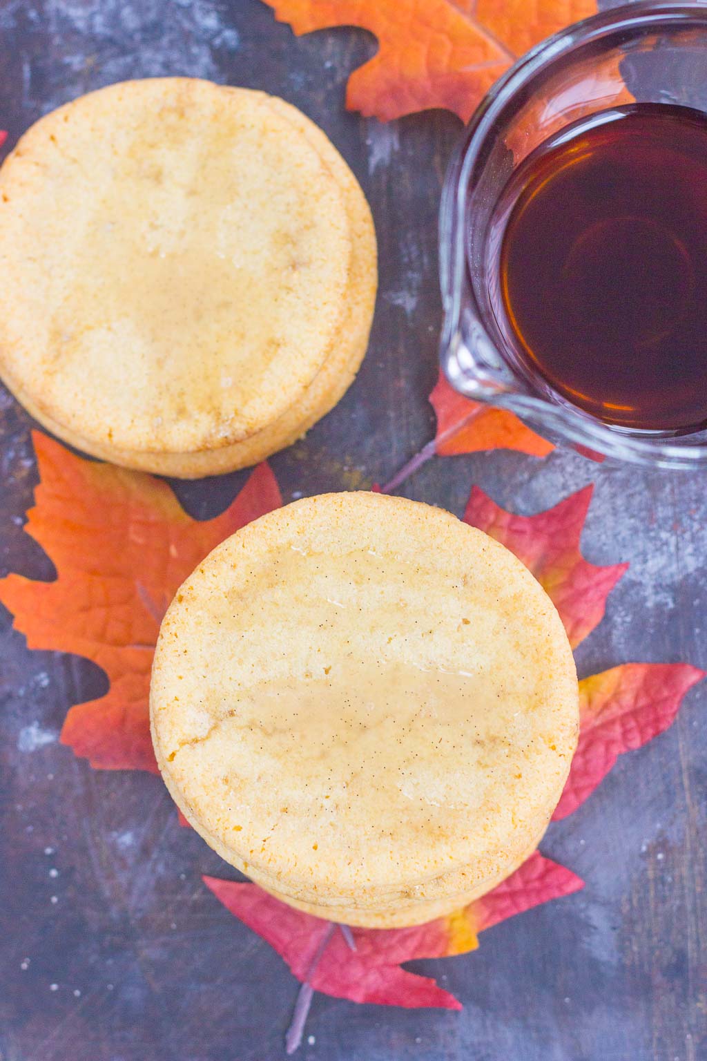 Overhead view of two stacks of maple cookies. 