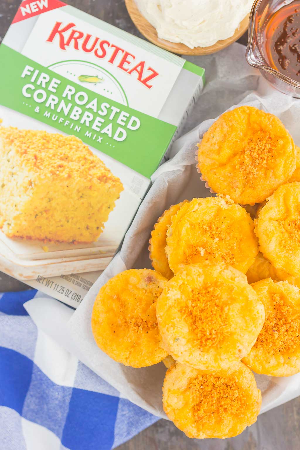 These Cheesy Cornbread Muffins are loaded with flavor and easy to make. Filled with cheddar cheese, zesty spices and baked until golden, these muffins are perfect to serve as a simple side dish or snack!