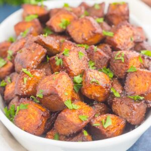 These Roasted Cinnamon Brown Sugar Sweet Potatoes make a deliciously simple side dish. Sweet cinnamon and brown sugar are tossed with sweet potatoes and roasted until crispy on the outside and tender on the inside. Loaded with flavor and easy to make, this dish is perfect for sweet potato lovers everywhere!