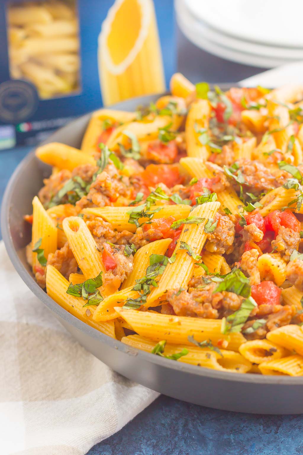 italian sausage penne pasta in large gray bowl