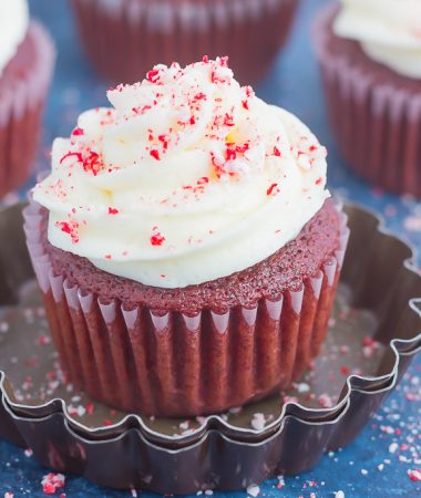 These Peppermint Red Velvet Cupcakes are light, fluffy, and bursting with sweet chocolate and hint of peppermint. Simple to make and topped with a swirl of peppermint frosting, these festive cupcakes will be the hit of the holiday season!