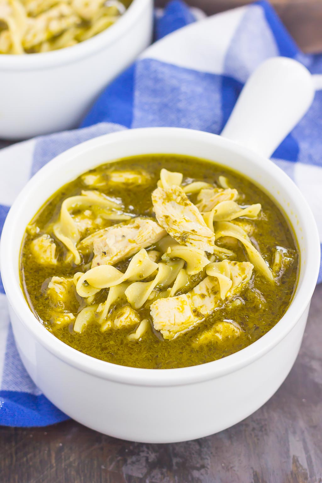 This Pesto Chicken Noodle Soup is made in one pot and ready in just 30 minutes! Filled with rotisserie chicken, tender noodles and enveloped in a simple pesto chicken broth, this easy dish is loaded with flavor and perfect for just about any time!