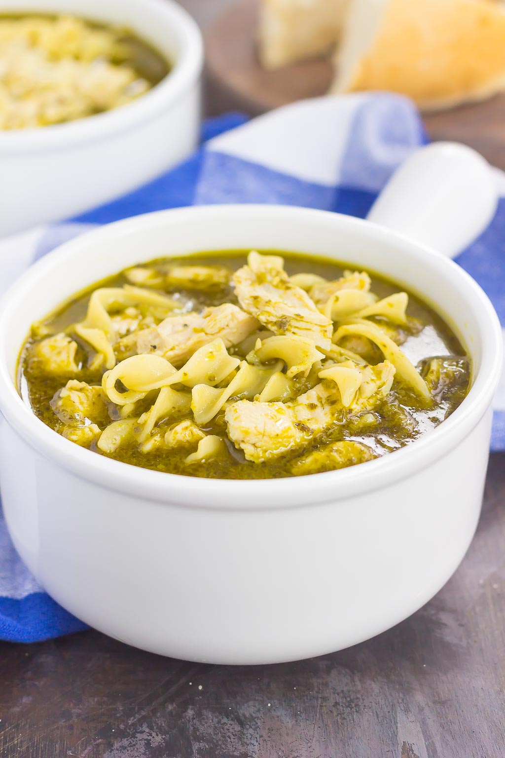 This Pesto Chicken Noodle Soup is made in one pot and ready in just 30 minutes! Filled with rotisserie chicken, tender noodles and enveloped in a simple pesto chicken broth, this easy dish is loaded with flavor and perfect for just about any time!