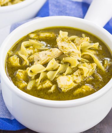 This Pesto Chicken Noodle Soup is made in one pot and ready in just 30 minutes! Filled with rotisserie chicken, tender noodles and enveloped in a simple pesto chicken broth, this easy dish is loaded with flavor and perfect for just about any time!