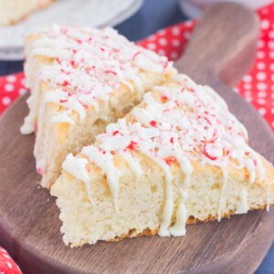 These White Chocolate Peppermint Scones are light, fluffy and bursting with flavor. Filled with hints of peppermint and topped with a white chocolate and peppermint glaze, these soft scones make the best holiday breakfast or dessert!