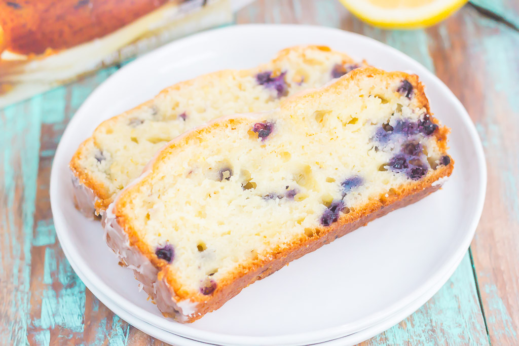 This Lemon Blueberry Bread is perfectly sweet, moist, and simple to make. An easy lemon glaze adds a touch of sweetness that makes this bread perfect for breakfast or dessert!