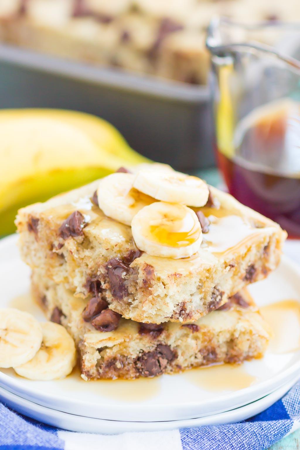 two sheet pan banana chocolate chip pancake squares a white plate