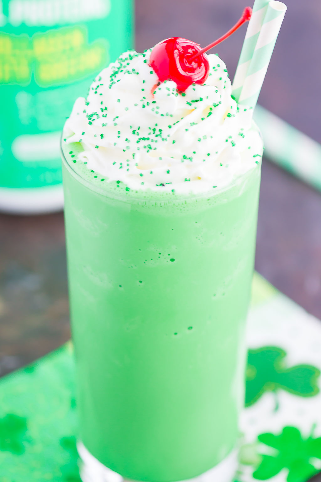 A homemade Shamrock Shake, garnished with whipped cream and a cherry. 