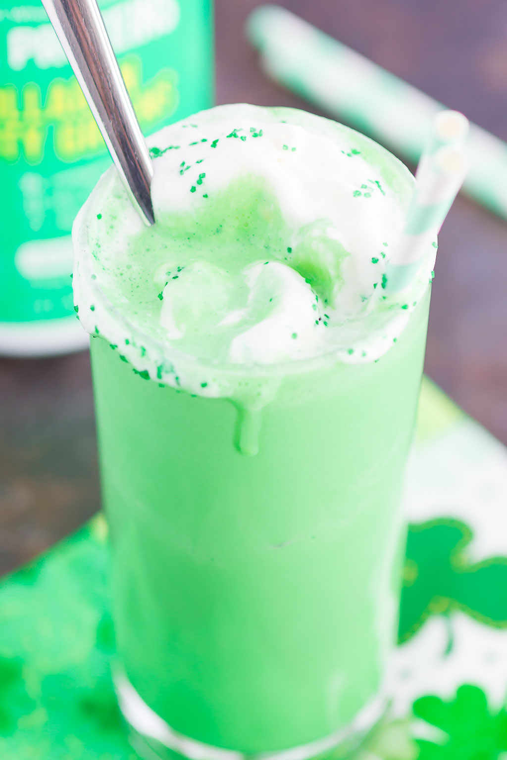 A DIY Shamrock Shake, garnished with whipped cream.