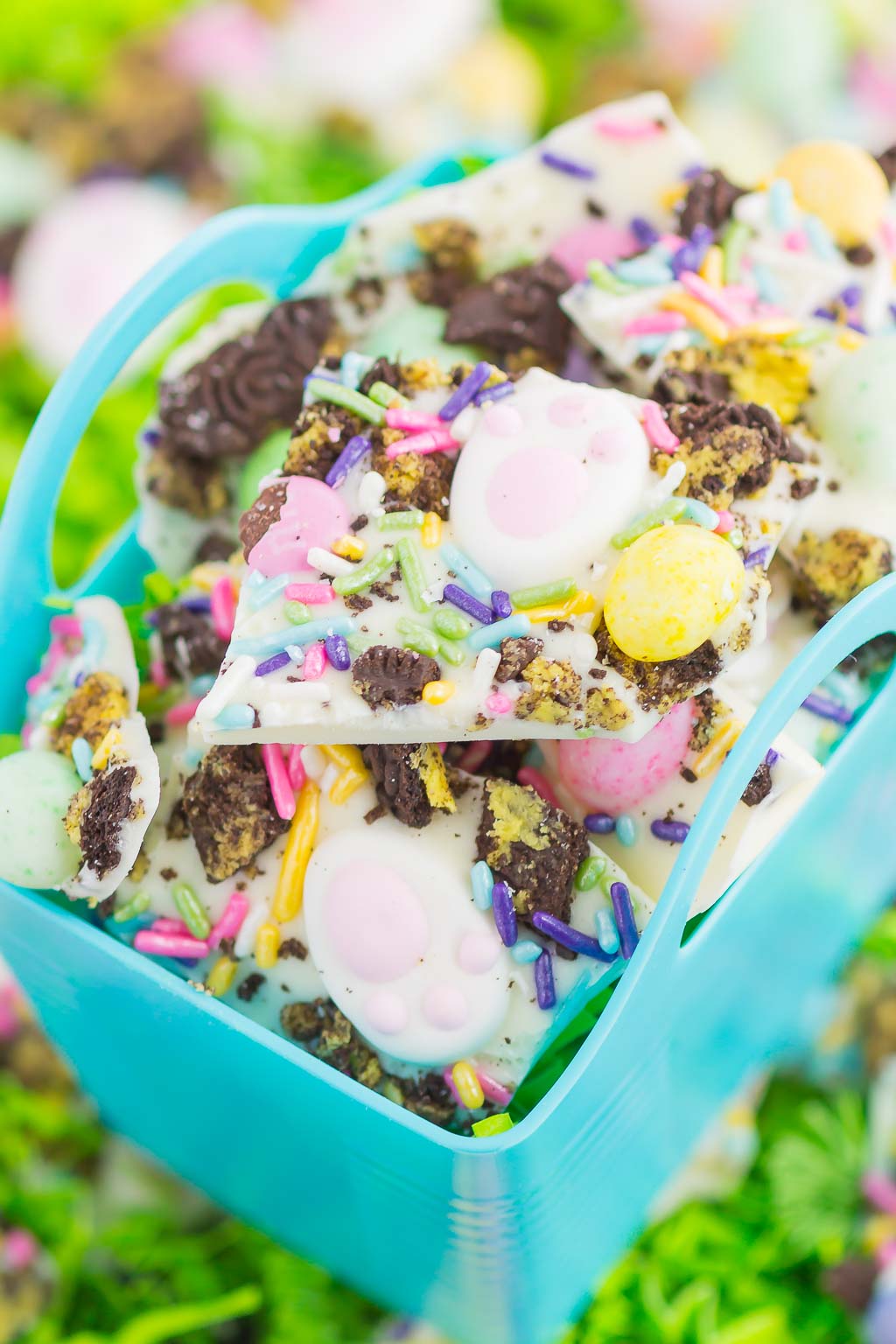 Pieces of Easter bark piled in a small blue basket. 