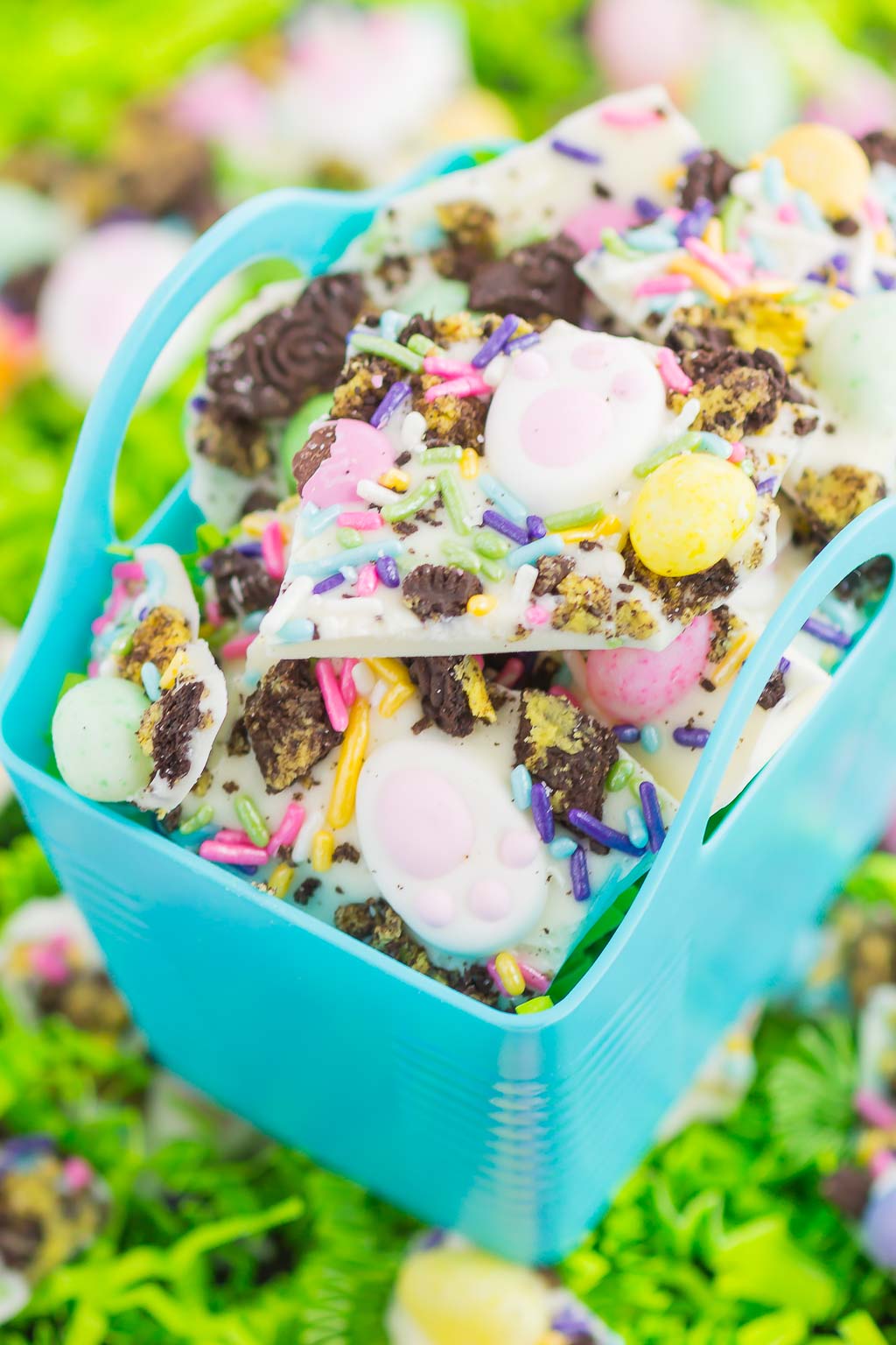 Pieces of Easter bark piled high in a small blue basket. 