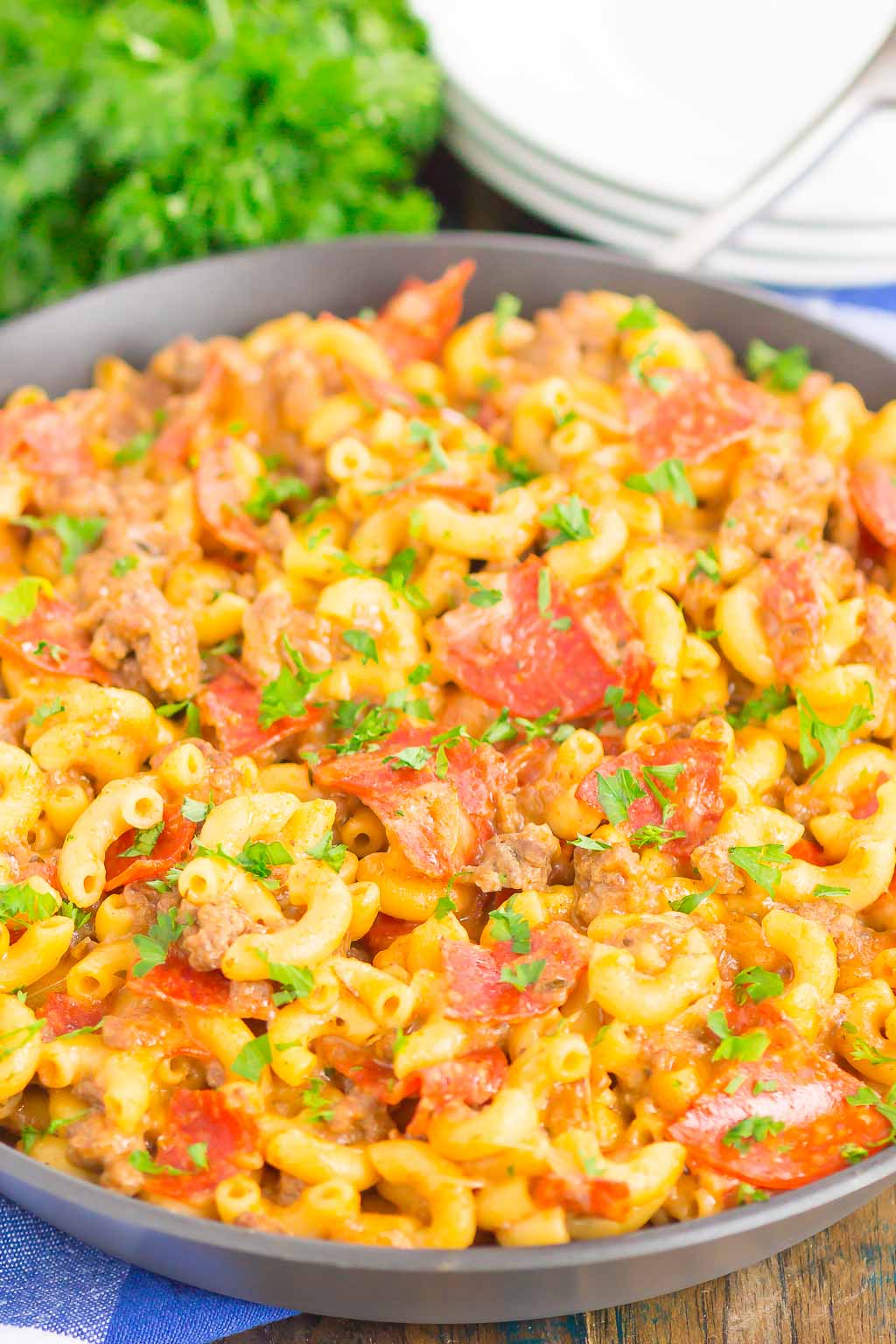 This Pepperoni Pizza Hamburger Helper is a simple, one pan dish that's ready in just 30 minutes. Better than the boxed kind, this cheesy pasta combines the classic flavors of pepperoni pizza that'll be a hit at the dinner table for years to come! #hamburgerhelper #pizzahamburgerhelper #pizzacasserole #pasta #pizzapasta #onepot