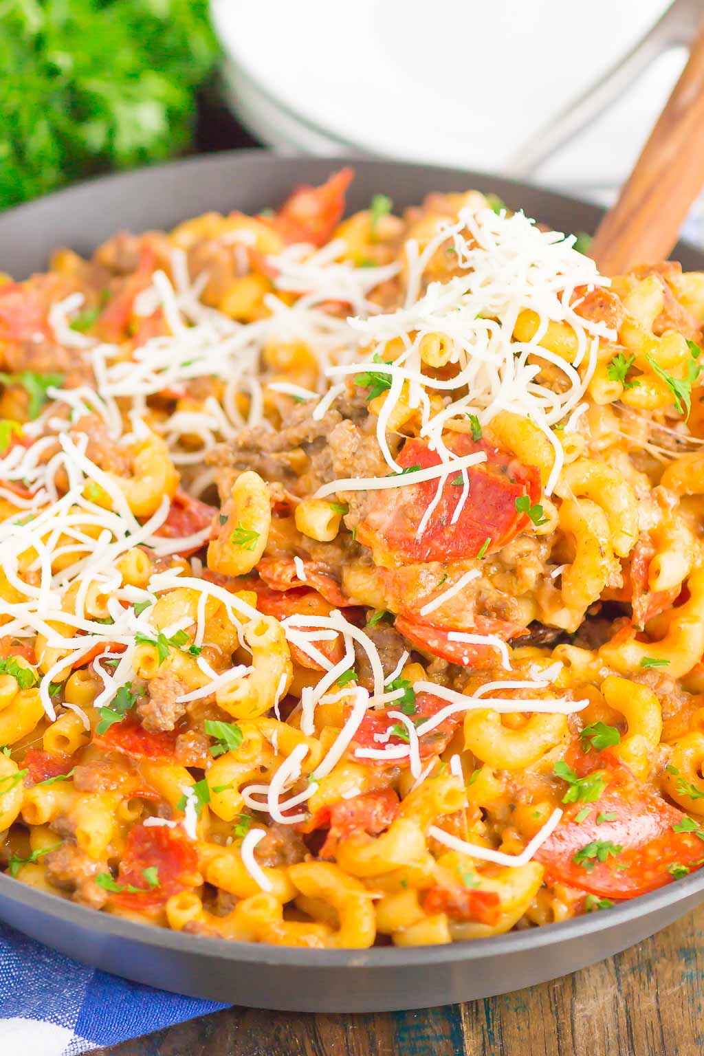 This Pepperoni Pizza Hamburger Helper is a simple, one pan dish that's ready in just 30 minutes. Better than the boxed kind, this cheesy pasta combines the classic flavors of pepperoni pizza that'll be a hit at the dinner table for years to come! #hamburgerhelper #pizzahamburgerhelper #pizzacasserole #pasta #pizzapasta #onepot