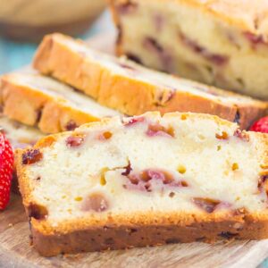 Strawberry Pound Cake is a simple, one bowl recipe that's bursting with flavor. Fresh strawberries are sprinkled throughout this soft and dense pound cake, resulting in the most delicious taste. Perfect to serve alongside your morning coffee or as a tasty dessert!