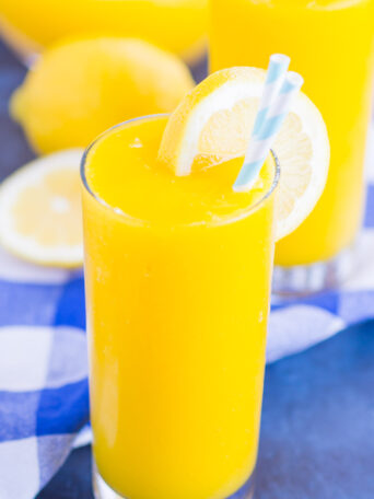 Frozen Mango Lemonade is a delicious way to beat the summer heat. With just four ingredients and ready in less than 5 minutes, you'll love the cool and creamy flavor of sweet mango and tart lemons!