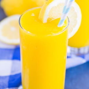 Frozen Mango Lemonade is a delicious way to beat the summer heat. With just four ingredients and ready in less than 5 minutes, you'll love the cool and creamy flavor of sweet mango and tart lemons!