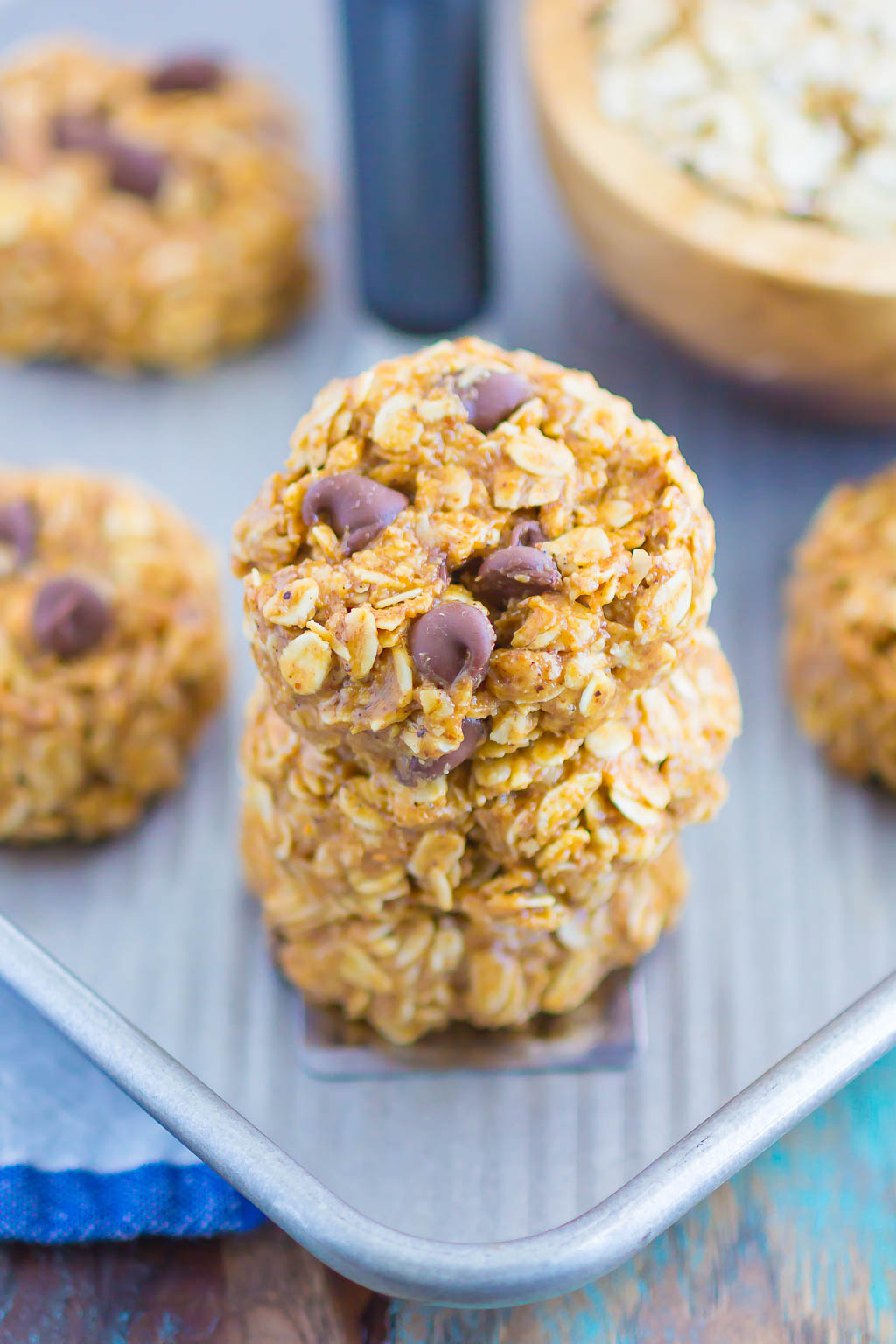 Stack of almond butter no bake cookies on a small spatula. 