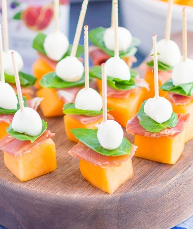 Prosciutto Melon Bites are a simple, sweet and salty appetizer that's perfect for any time. Salty prosciutto and sweet melon are paired with fresh mozzarella and basil to create a match made in food heaven. Easy to make and ready in no time, everyone will love these tasty bites!