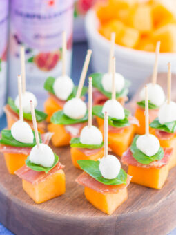 Prosciutto Melon Bites are a simple, sweet and salty appetizer that's perfect for any time. Salty prosciutto and sweet melon are paired with fresh mozzarella and basil to create a match made in food heaven. Easy to make and ready in no time, everyone will love these tasty bites!