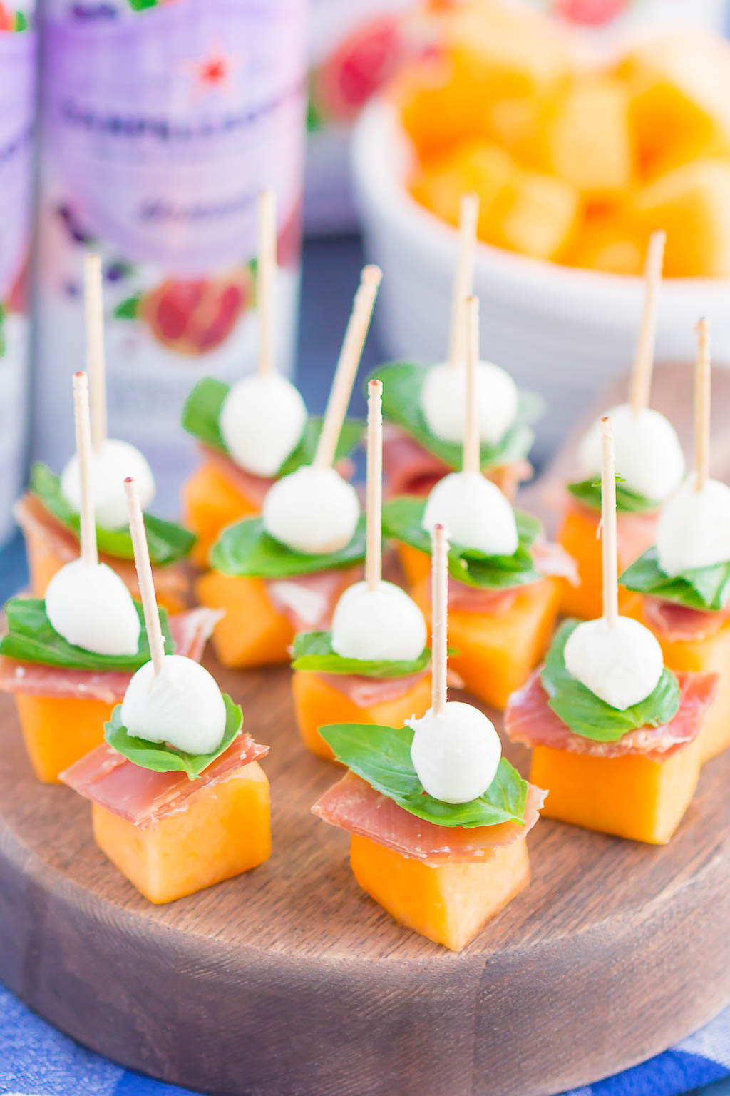 Prosciutto Melon Bites are a simple, sweet and salty appetizer that's perfect for any time. Salty prosciutto and sweet melon are paired with fresh mozzarella and basil to create a match made in food heaven. Easy to make and ready in no time, everyone will love these tasty bites! #prosciuttobites #melonbites #prosciuttomelon #prosciuttoappetizer