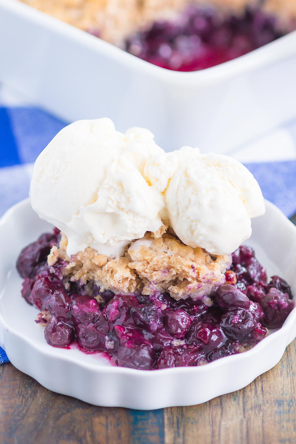 Easy Blueberry Cobbler is simple dessert that's ready in no time. Tangy blueberries are tossed with cozy spices and then sprinkled with a buttery, cinnamon sugar cake-like topping. Easy to make and loaded with flavor, this cozy cobbler is perfect to enjoy all year long!