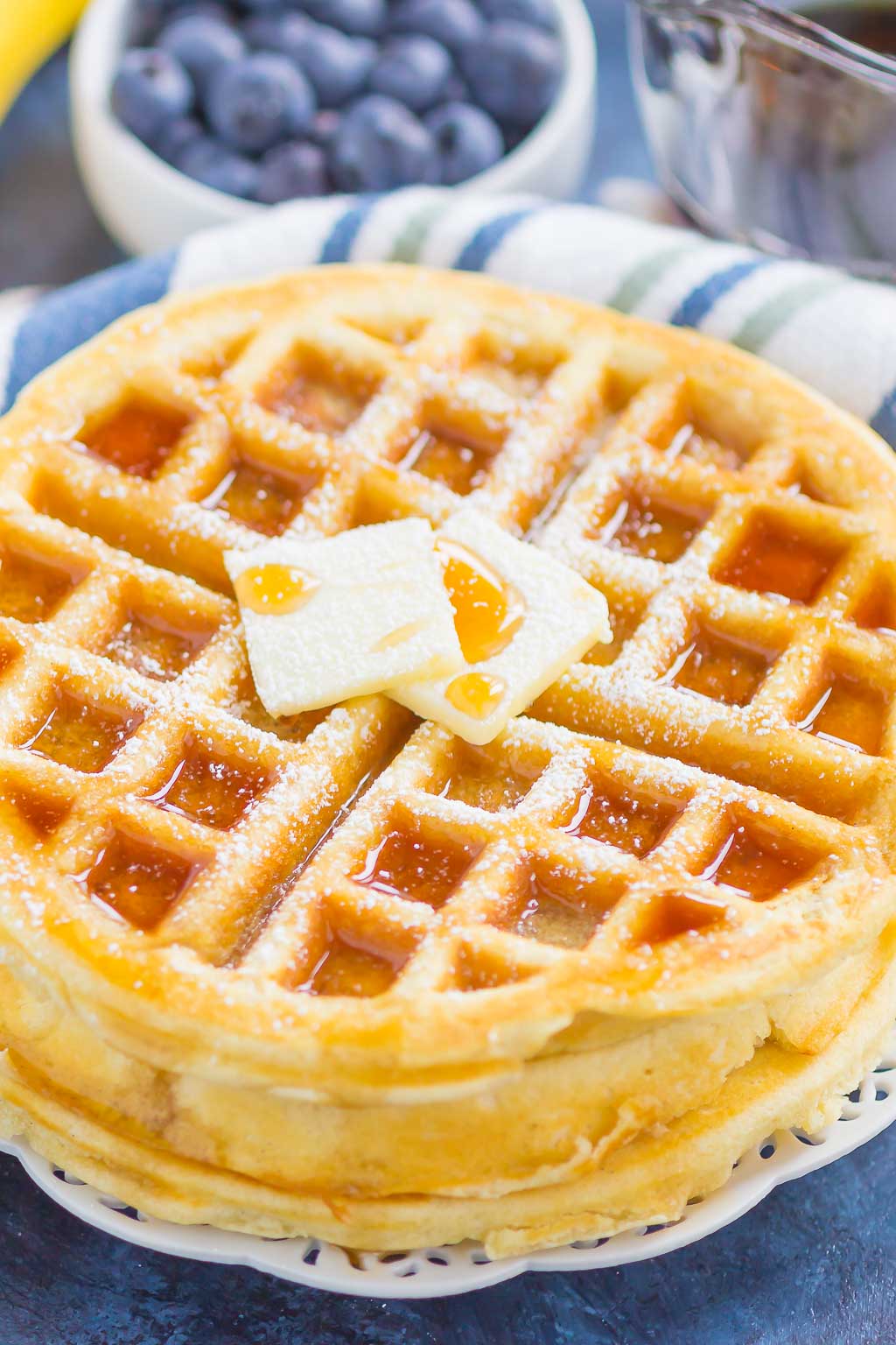 Fluffy Belgian Waffles are crispy on the outside, tender on the inside, and so easy to make. Just a few ingredients is all it takes to whip up these golden waffles, all with ingredients you have in your kitchen!