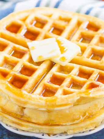 Fluffy Belgian Waffles are crispy on the outside, tender on the inside, and so easy to make. Just a few ingredients is all it takes to whip up these golden waffles, all with ingredients you have in your kitchen!
