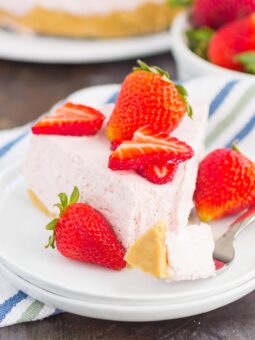 No Bake Strawberry Cheesecake is a simple dessert that's perfect for summer. A golden cookie crust is topped with a creamy strawberry cheesecake filling and then chilled to perfection. Easy to make and with no oven required, this decadent cake makes the most delicious treat!