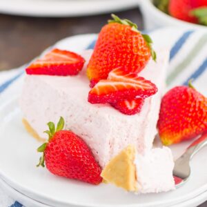 No Bake Strawberry Cheesecake is a simple dessert that's perfect for summer. A golden cookie crust is topped with a creamy strawberry cheesecake filling and then chilled to perfection. Easy to make and with no oven required, this decadent cake makes the most delicious treat!