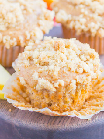 Apple Cinnamon Muffins are soft, moist, and bursting with cozy flavors. With tender chunks of fresh apples, a swirl of sweet cinnamon and a buttery, crunchy, streusel topping, these muffins make the best breakfast or dessert!