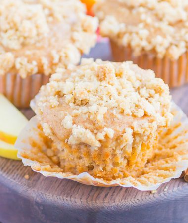 Apple Cinnamon Muffins are soft, moist, and bursting with cozy flavors. With tender chunks of fresh apples, a swirl of sweet cinnamon and a buttery, crunchy, streusel topping, these muffins make the best breakfast or dessert!