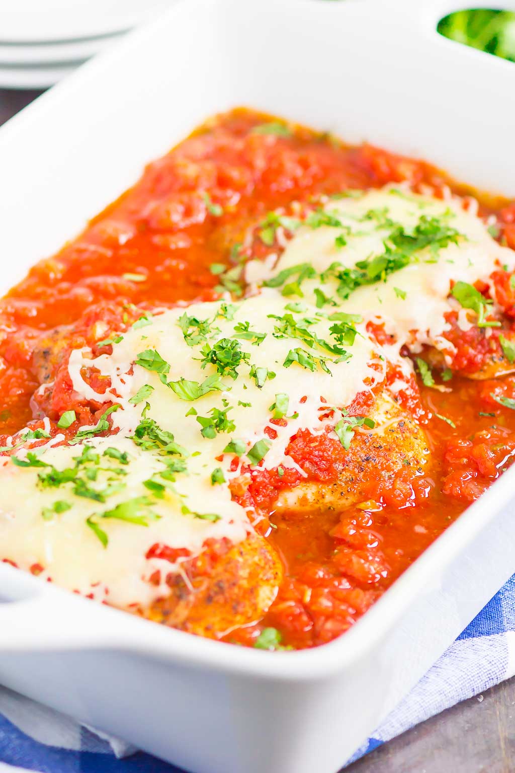 baked salsa chicken topped with mozzarella in baking dish