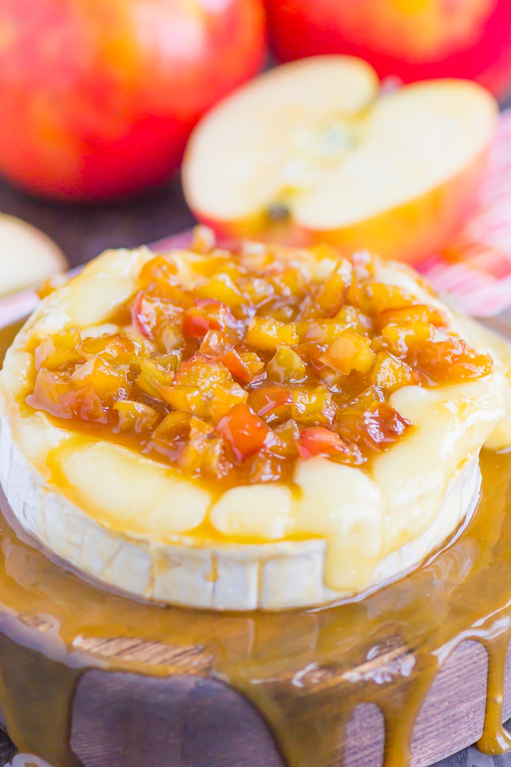 Caramel Apple Baked Brie is an easy appetizer that's ready in just 10 minutes. Fresh apples are sautÃ©ed in a buttery brown sugar mixture, drizzled with caramel, and then added to the melty brie. Perfect to serve with pita chips or apple slices, this gooey cheese is guaranteed to be a hit all year long! #brie #bakedbrie #caramel #apples #caramelapple #appetizer #brierecipe #fall recipe #fallappetizer #recipe