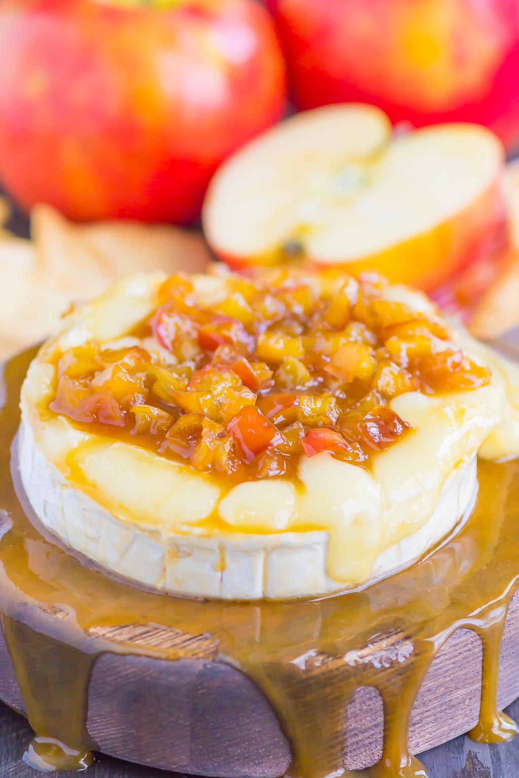 Caramel Apple Baked Brie is an easy appetizer that's ready in just 10 minutes. Fresh apples are sautÃ©ed in a buttery brown sugar mixture, drizzled with caramel, and then added to the melty brie. Perfect to serve with pita chips or apple slices, this gooey cheese is guaranteed to be a hit all year long! #brie #bakedbrie #caramel #apples #caramelapple #appetizer #brierecipe #fall recipe #fallappetizer #recipe