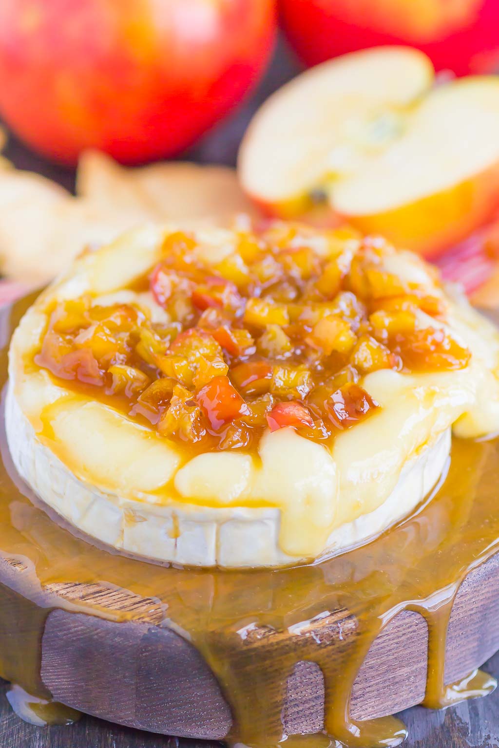 Caramel Apple Baked Brie is an easy appetizer that's ready in just 10 minutes. Fresh apples are sautÃ©ed in a buttery brown sugar mixture, drizzled with caramel, and then added to the melty brie. Perfect to serve with pita chips or apple slices, this gooey cheese is guaranteed to be a hit all year long! #brie #bakedbrie #caramel #apples #caramelapple #appetizer #brierecipe #fall recipe #fallappetizer #recipe