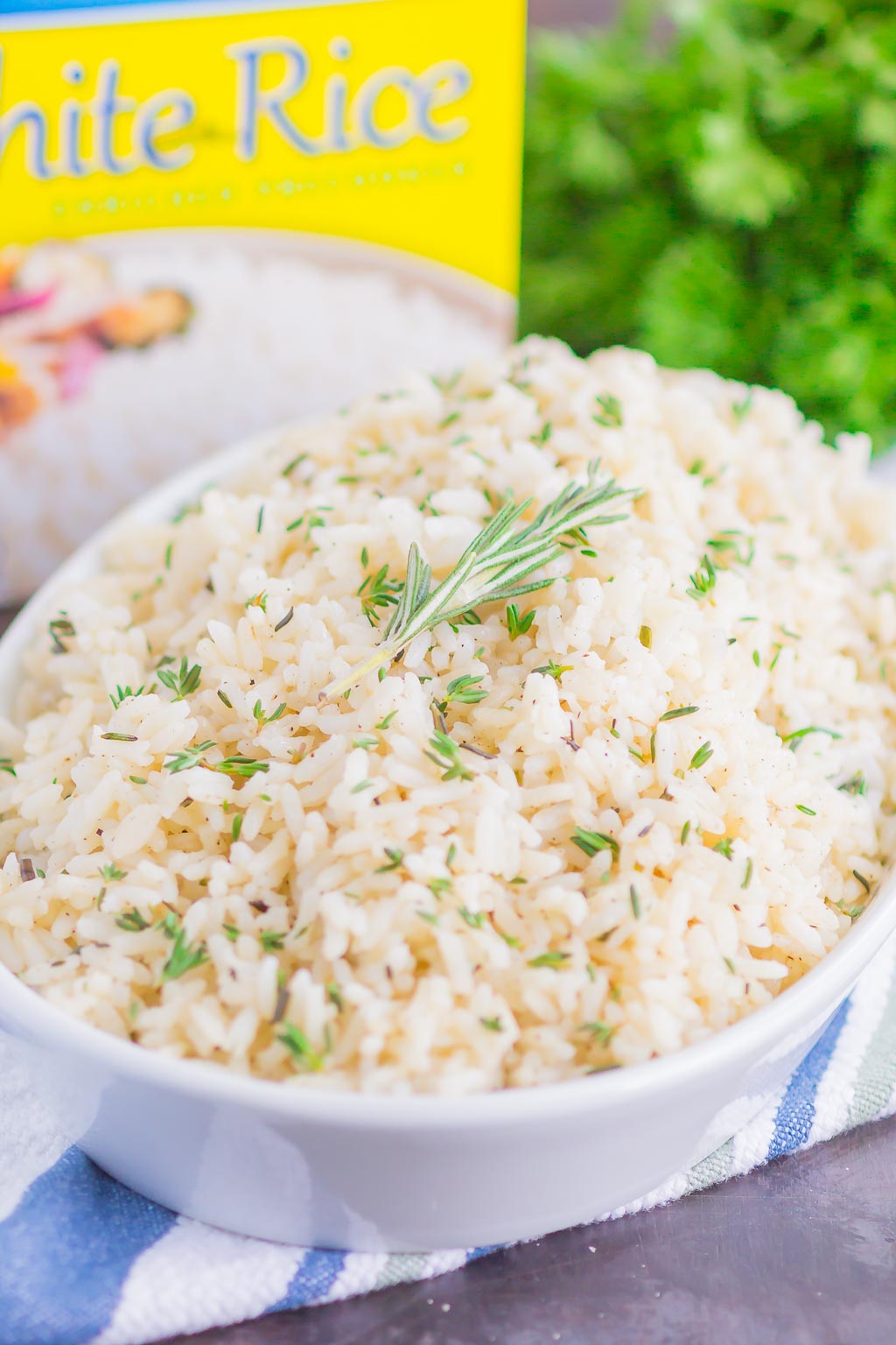 Garlic Herb Rice is a simple side dish that's ready in just 20 minutes. A mixture of fresh herbs, garlic and butter make this easy dish loaded with flavor and perfect to accompany any meal!