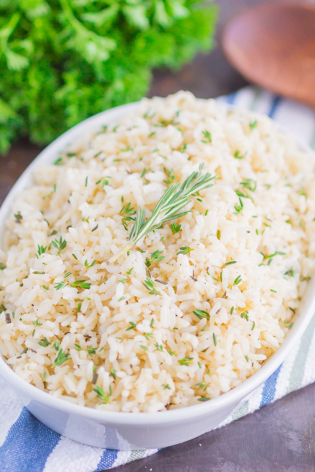 Garlic Herb Rice is a simple side dish that's ready in just 20 minutes. A mixture of fresh herbs, garlic and butter make this easy dish loaded with flavor and perfect to accompany any meal!