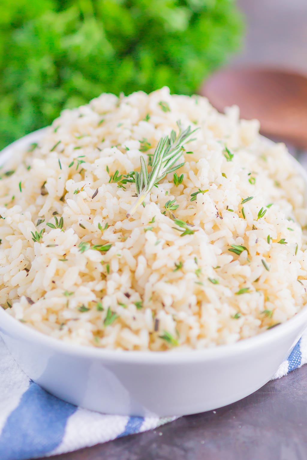 Garlic Herb Rice is a simple side dish that's ready in just 20 minutes. A mixture of fresh herbs, garlic and butter make this easy dish loaded with flavor and perfect to accompany any meal!