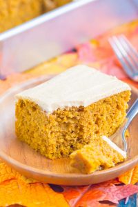 pumpkin spice cake on a plate with a fork