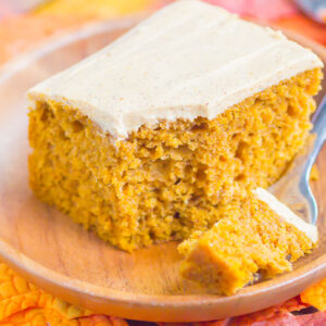 This Pumpkin Spice Cake is a simple treat filled with cozy fall flavors. It's soft, moist and topped with an easy pumpkin cream cheese frosting. One bite and you'll fall in love with pumpkin all over again! #cake #pumpkincake #pumpkinspice #pumpkinspicecake #creamcheesefrosting #pumpkincreamcheesefrosting #pumpkinfrosting #fallcake #fallrecipe #falldessert #pumpkindessert #recipe