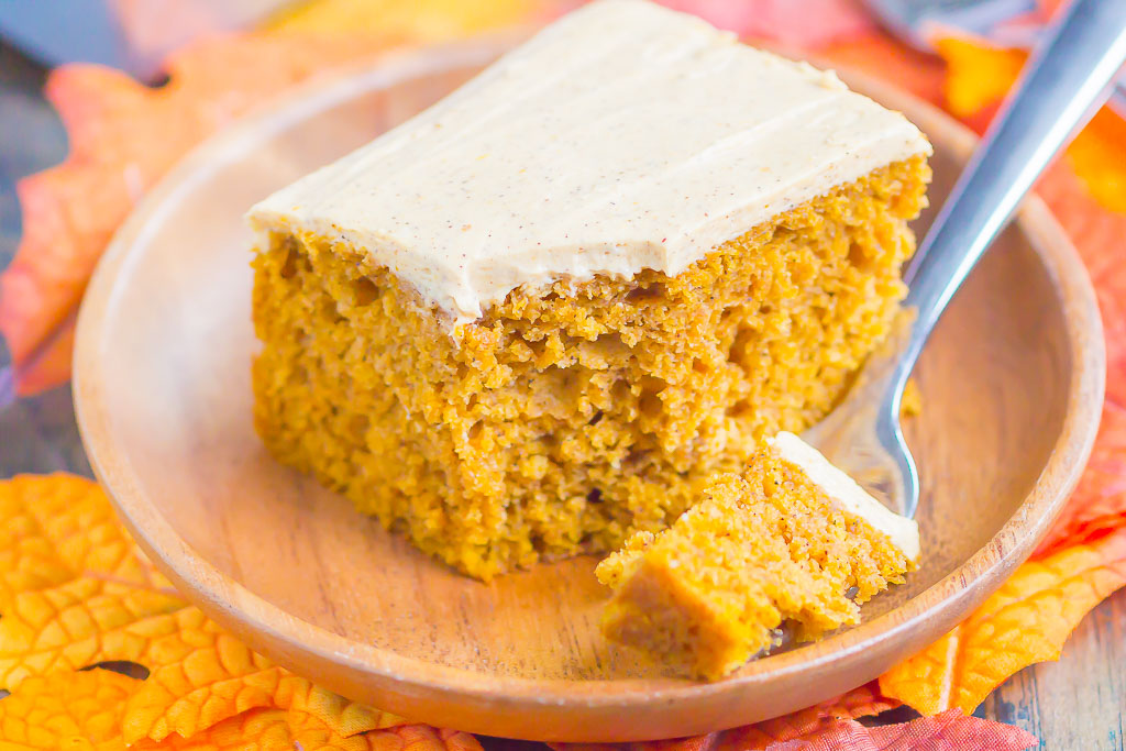 This Pumpkin Spice Cake is a simple treat filled with cozy fall flavors. It's soft, moist and topped with an easy pumpkin cream cheese frosting. One bite and you'll fall in love with pumpkin all over again! #cake #pumpkincake #pumpkinspice #pumpkinspicecake #creamcheesefrosting #pumpkincreamcheesefrosting #pumpkinfrosting #fallcake #fallrecipe #falldessert #pumpkindessert #recipe