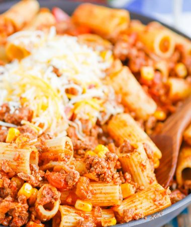 There is no better comfort food than this Chili with Pasta skillet meal. A comforting combination of ground beef, tomatoes, corn, and pasta come together with the perfect homemade chili seasoning to create an all in one meal you’ll love! #chili #chilipasta #chilipastaskillet #skilletdinner #pasta #easydinner #dinner #comfortfood