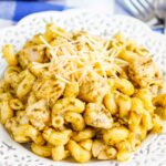 Instant Pot Pesto Chicken with Pasta is a delicious weeknight meal that combines the bright basil and garlic flavor of pesto with easy to cook chicken and pasta. The entire meal made in your Instant Pot in a little more than 30 minutes makes this a perfect weeknight recipe! #chicken #pestochicken #pesto #pestochickenpasta #pasta #instantpot #instantpotchicken #instantpotpasta #weeknightdinner #easydinner #dinner