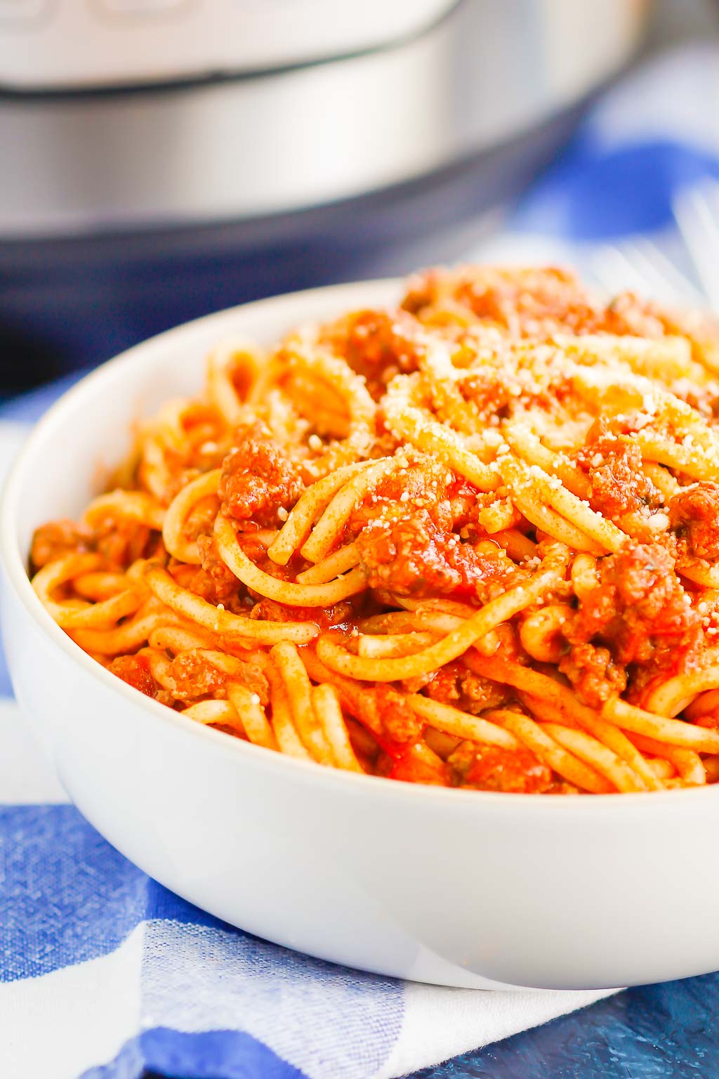 A serving of pressure cooker spaghetti in a large white bowl. 