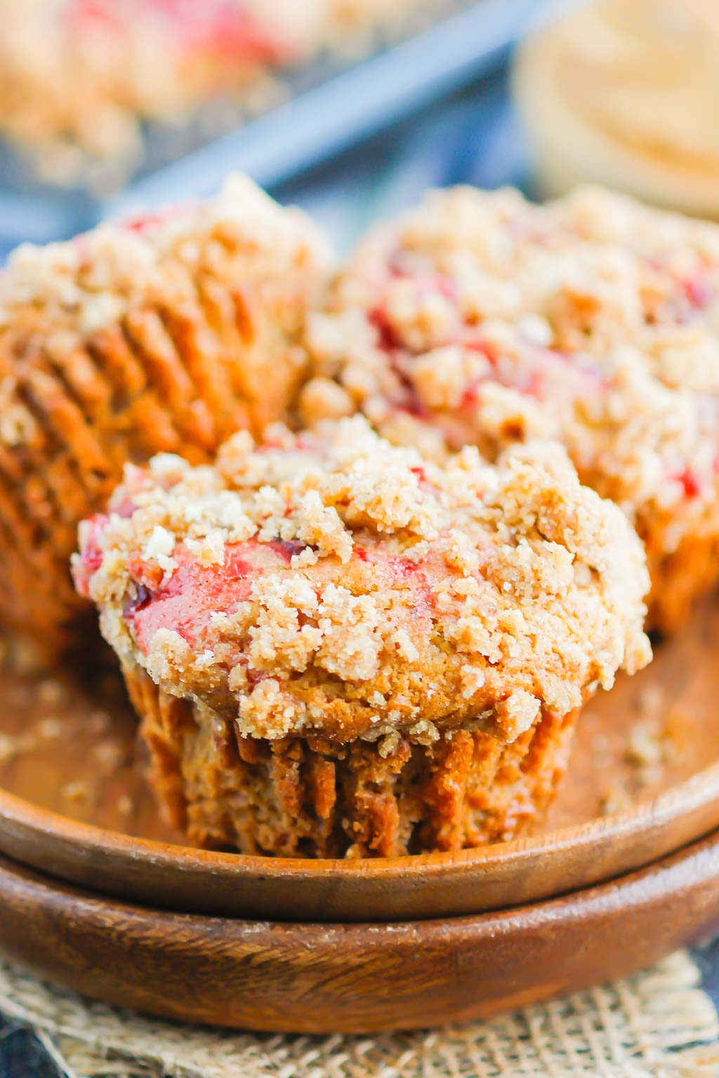 Peanut Butter and Jelly Muffins are the perfect breakfast, snack, or even dessert. A sweet peanut butter muffin is swirled with strawberry jelly and then sprinkled with the most delicious crumb topping. These tasty muffins are kid-friendly and perfect for just about any time! #peanutbuttermuffins #peanutbutterjellymuffins #peanutbutterandjelly #peanutbutterrecipe #snackideas #backtoschoolrecipe #muffinrecipe #breakfast #dessert #peanutbutterdessert