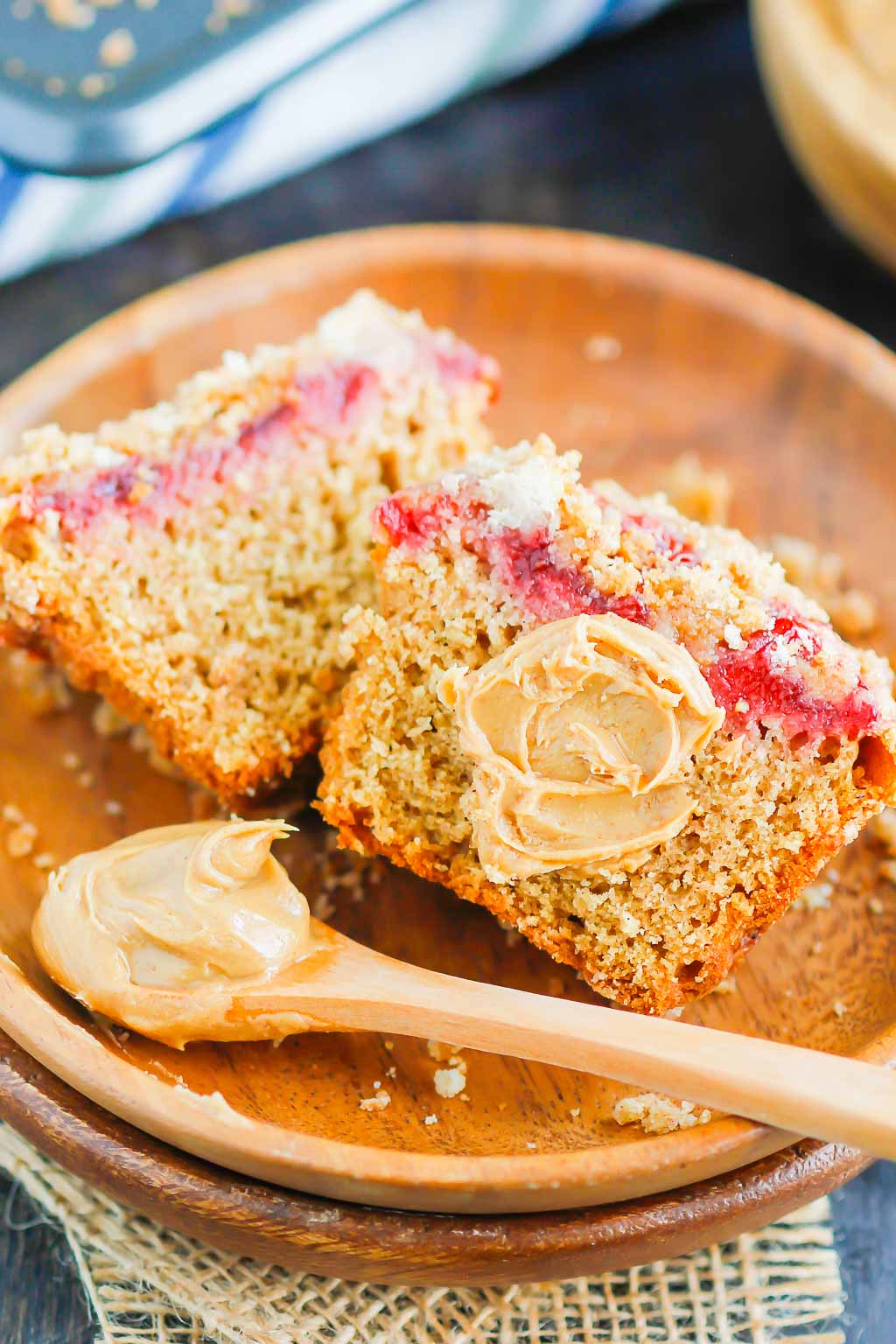 Peanut Butter and Jelly Muffins are the perfect breakfast, snack, or even dessert. A sweet peanut butter muffin is swirled with strawberry jelly and then sprinkled with the most delicious crumb topping. These tasty muffins are kid-friendly and perfect for just about any time! #peanutbuttermuffins #peanutbutterjellymuffins #peanutbutterandjelly #peanutbutterrecipe #snackideas #backtoschoolrecipe #muffinrecipe #breakfast #dessert #peanutbutterdessert