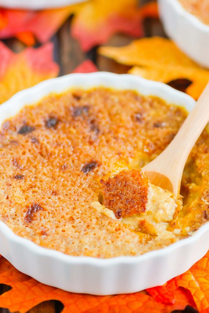 Pumpkin Crème Brûlée features a smooth and creamy custard that's studded with hints of pumpkin and the most delicious caramelized topping. Easy to make, this decadent dessert captures the flavors of fall and is sure to impress everyone! #cremebrulee #pumpkin #pumpkincremebrulee #cremebruleerecipe #falldessert #pumpkindessert #fancydessert