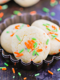 These Halloween Cookies are soft, fluffy, and made with just 4 ingredients. The sprinkles lend some Halloween fun and using cake mix makes it so easy. It's a simple recipe for a spooky night! #halloween #cookies #easy #homemade #spooky #simple #recipe #halloweenrecipes #cakemixcookies #cookierecipes